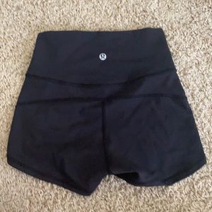 BLACK LULULEMON SHORTS (SIZE 2)